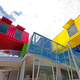 Image for article titled Seven Shipping Containers Make Up This Colorful Library